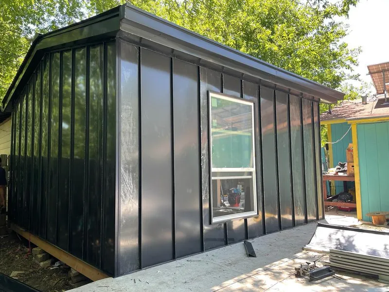 Black standing seam metal wall panels for Metal Roof Installation in Avon